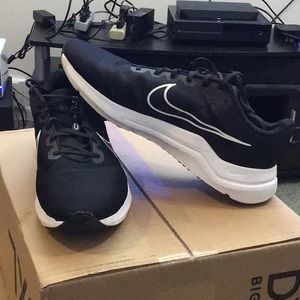 Nike “downshifted” sneakers. Perfect condition